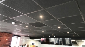 Suspended ceiling with black ceiling tiles