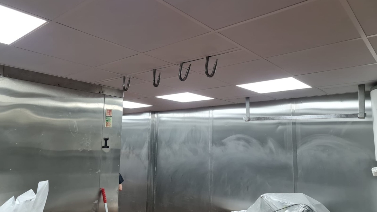 The refitted ceiling in a butcher's preparation area